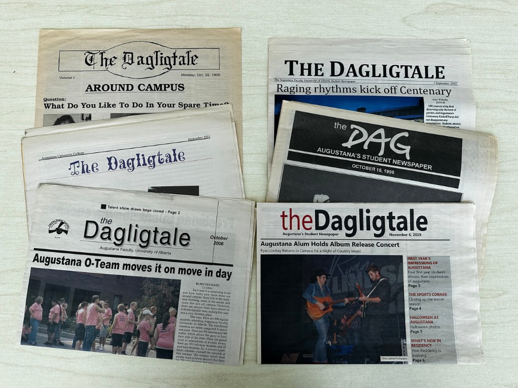 Various issues of The Dagligtale laid out on a table.