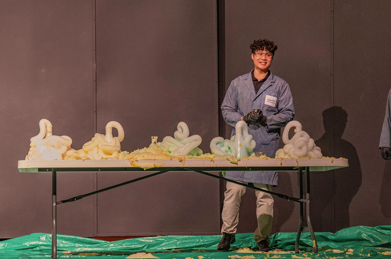 Student conducting a chemistry experiment.