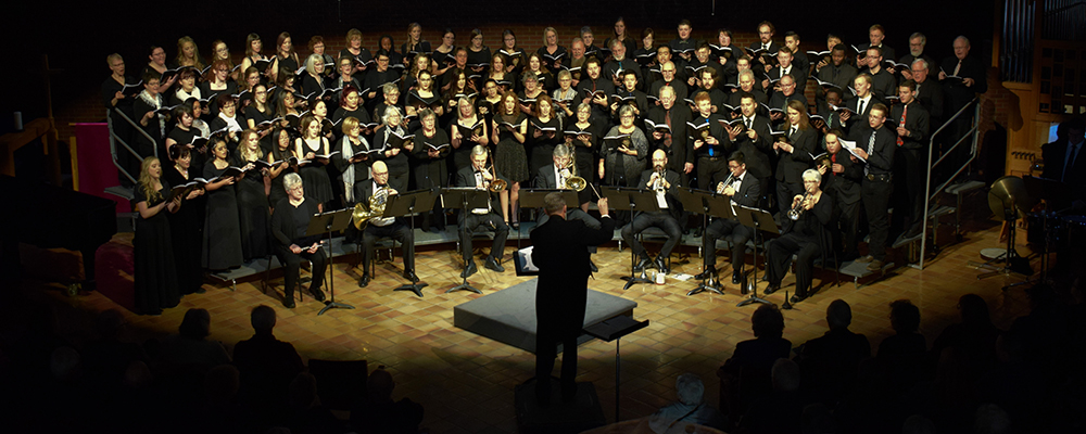 John Wiebe conducting an Augustana choir.