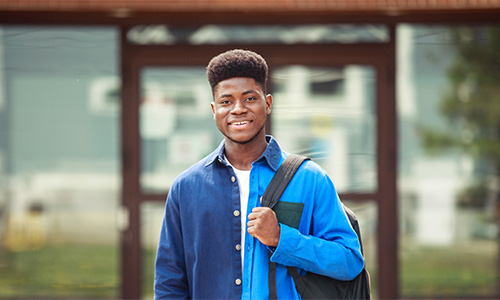 Anjola Fadayomi in front of Hoyme Hall Residence.