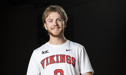 Headshot of Dylan Draker in Vikings men's volleyball uniform.