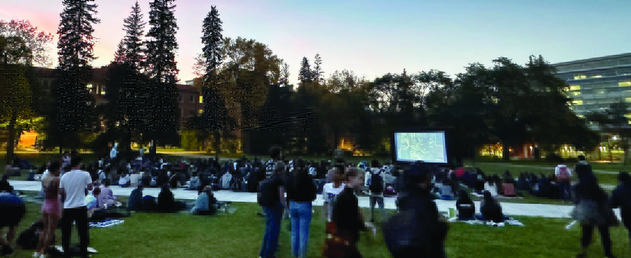 People watching movie at the Quad 