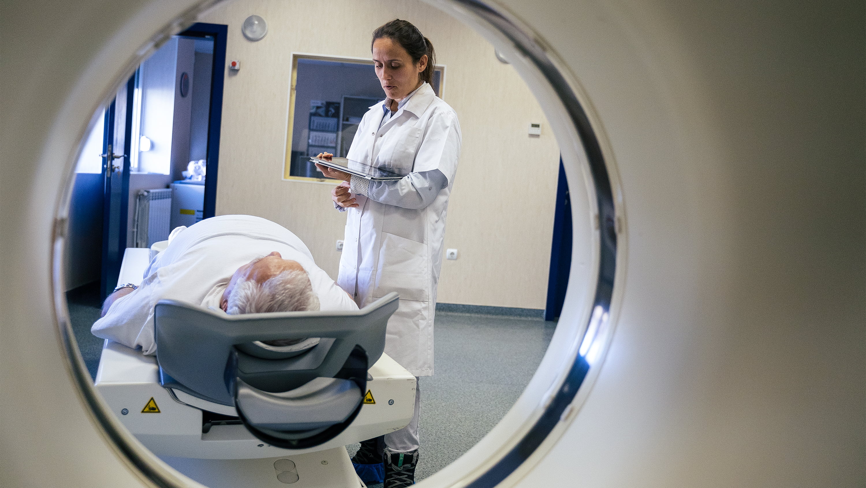woman at MRI machine