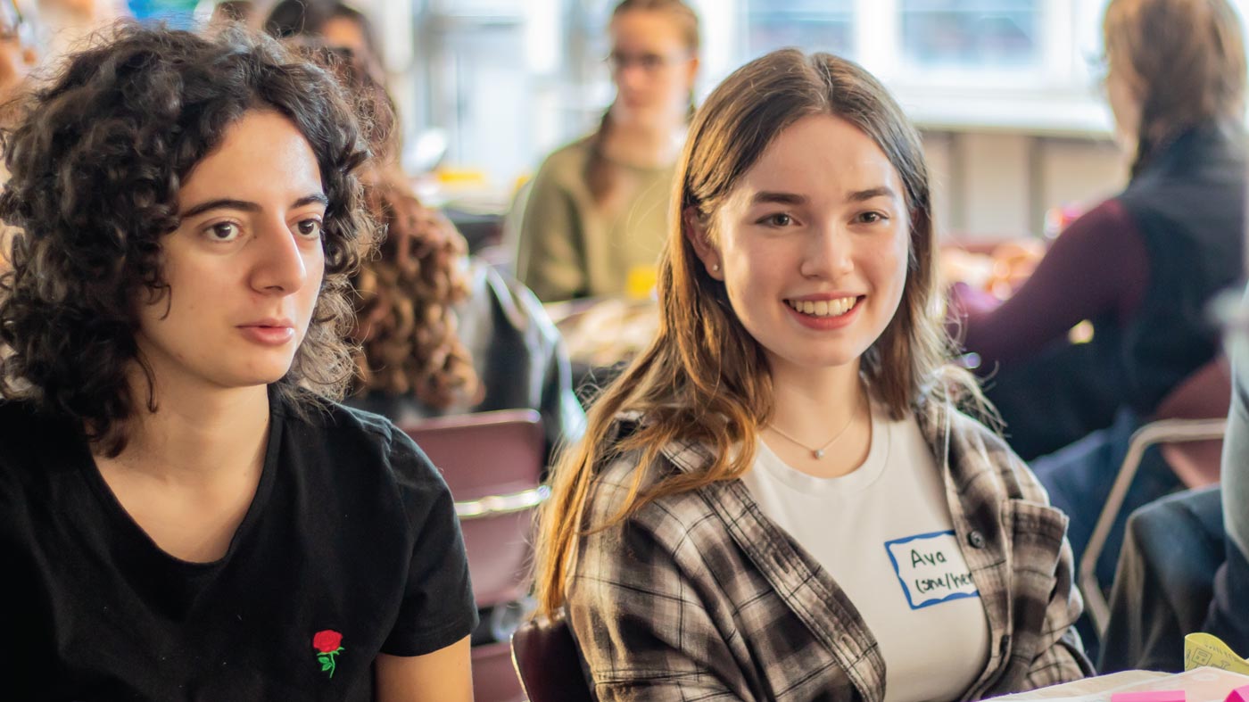 Two girls sitting in a DiscoverE class