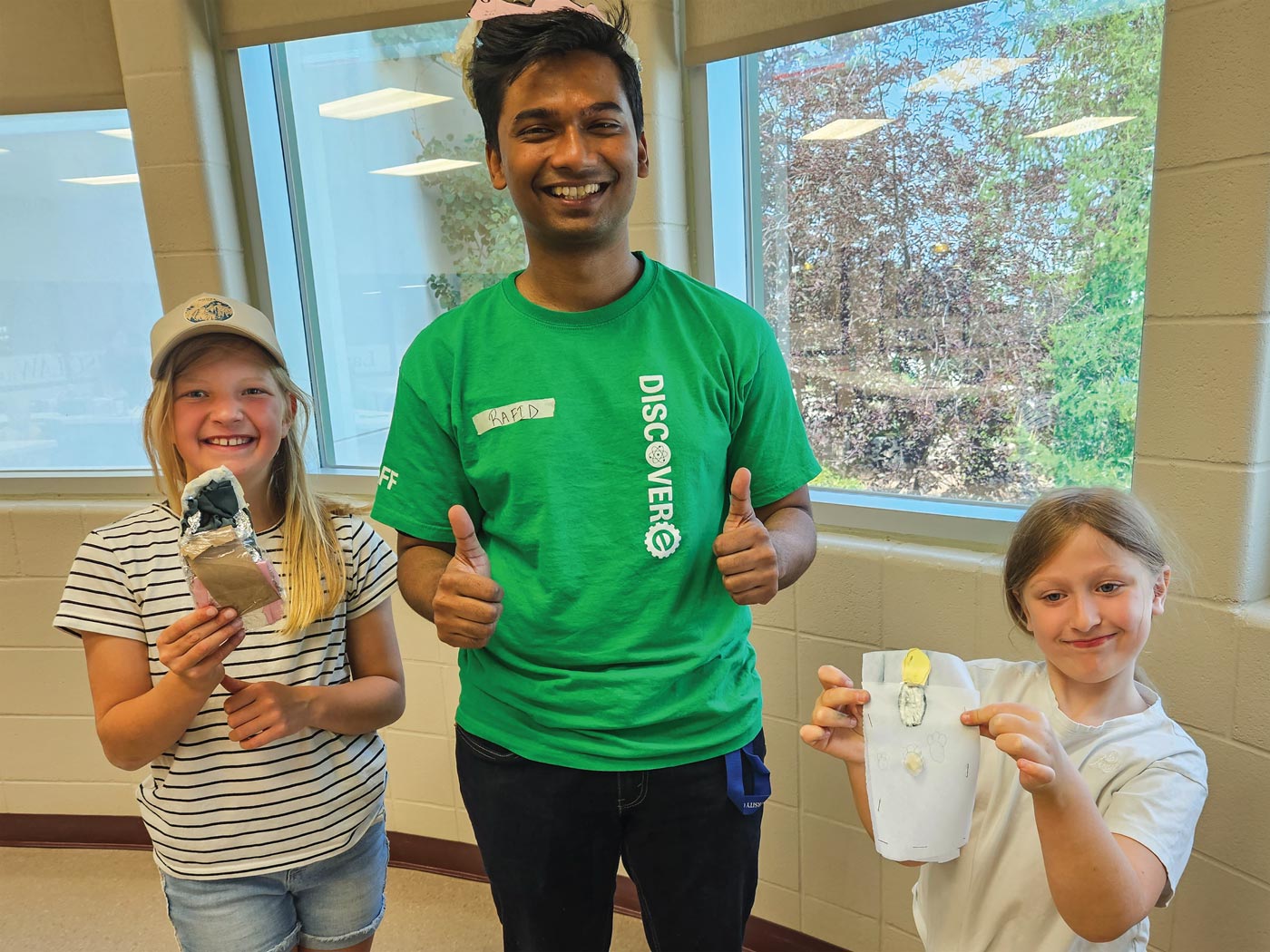 DiscoverE instructor with campers