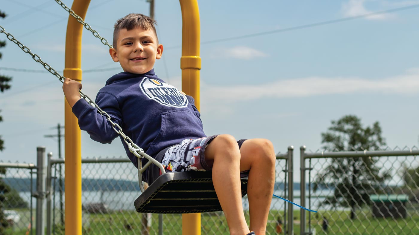 Child swinging on a swing