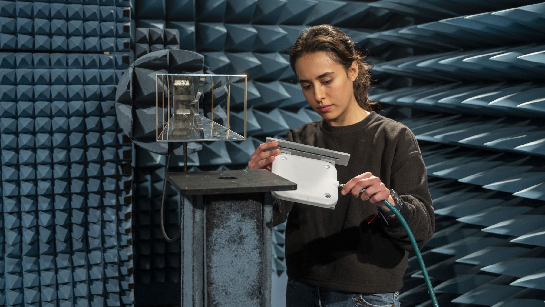 Woman operating advanced machinery