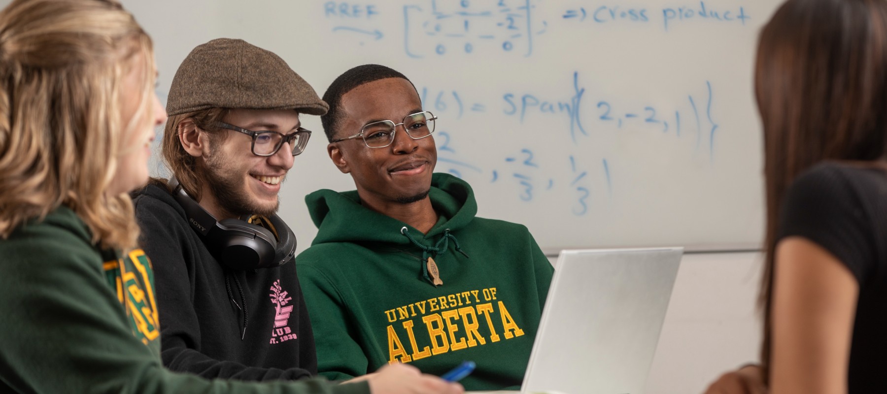 Four students having a conversation