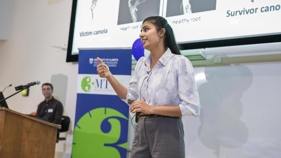 Student presenting at a 3MT competition