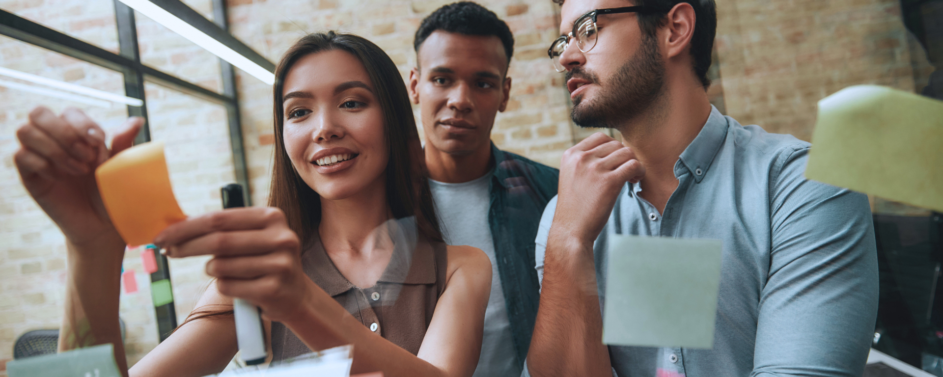 Three graduate students and postdoctoral scholars practice design thinking as academics