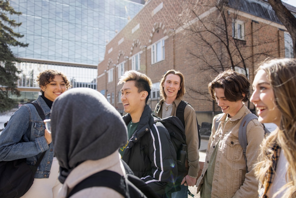 Students laughing together outside