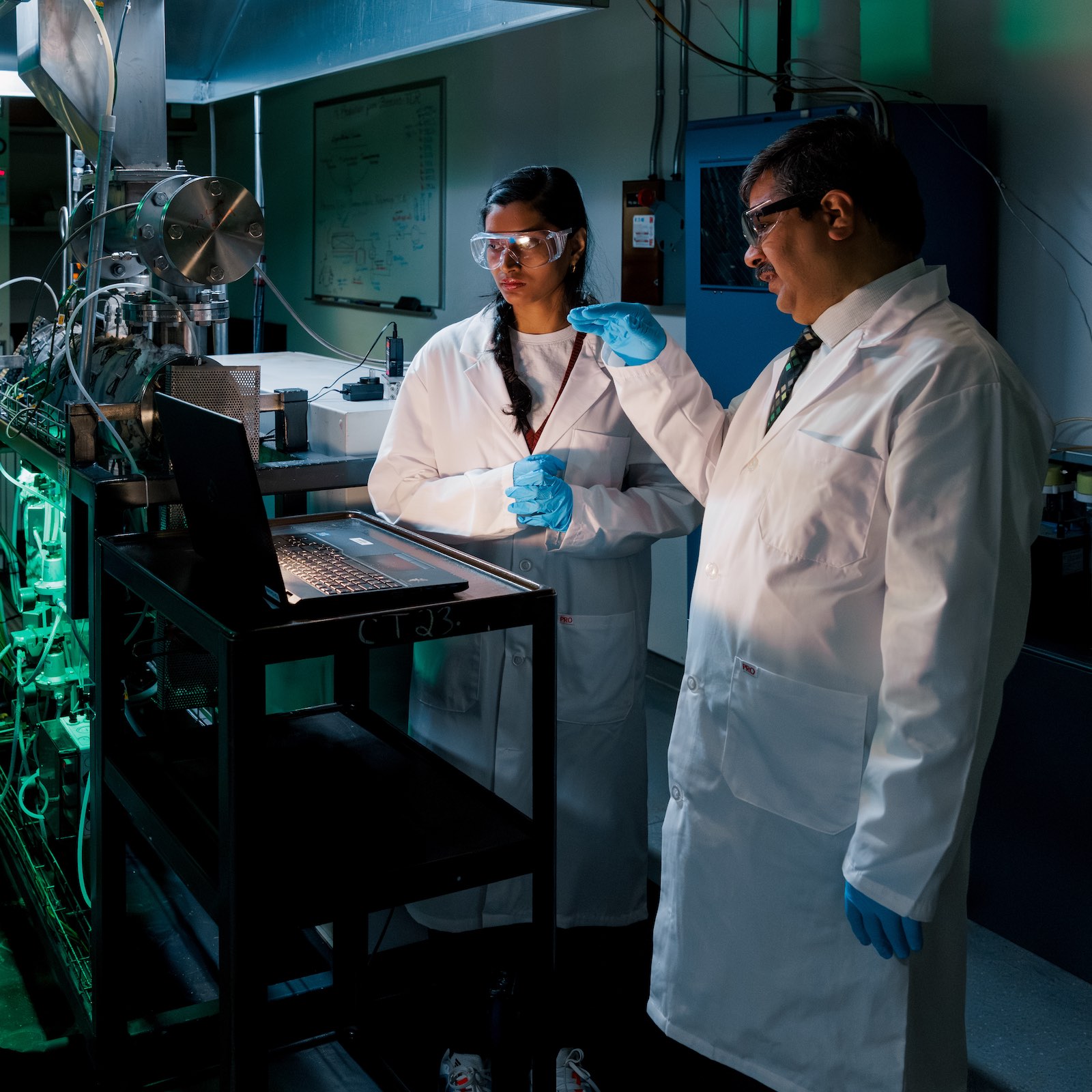 Amit Kumar and a student in the hydrogen lab