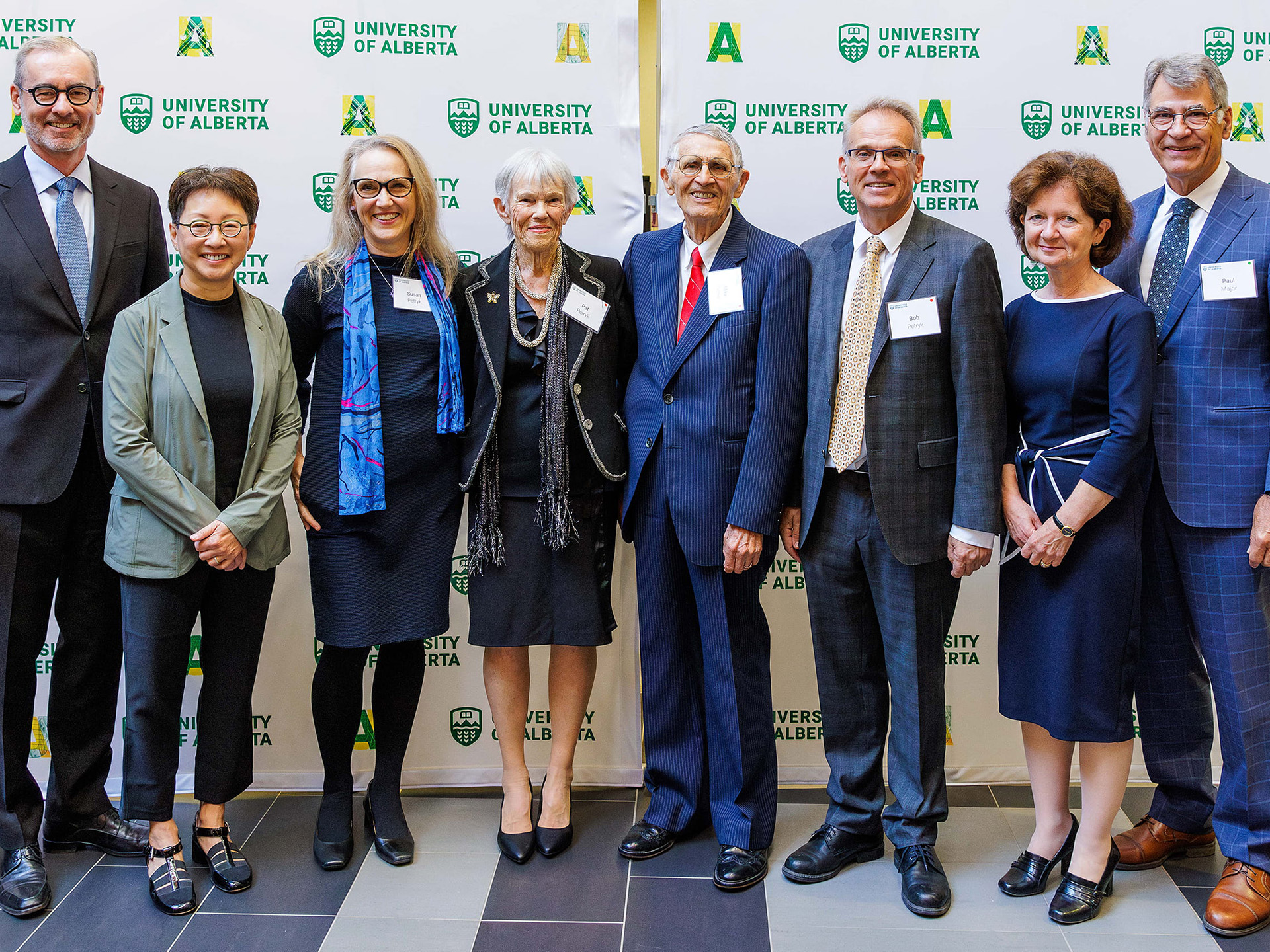 President Bill Flanagan; provost Verna Yiu; Susan, Pat, Mike and Bob Petryk; dean Brenda Hemmelgarn; dentistry chair Paul Major
