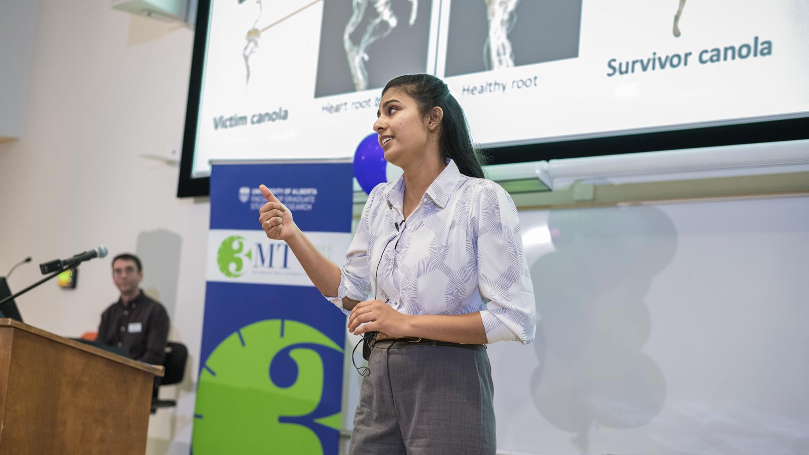 Student presenting at a 3MT competition