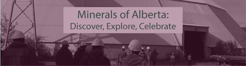 Purple sepia toned image of workers in hardhats heading towards a building reading "Minerals of Alberta"