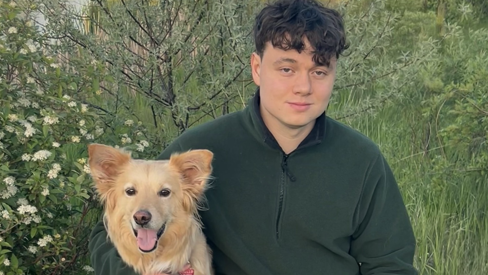 Portrait of Matthew and his dog.